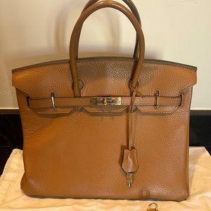 Classic style pebbled leather satchel in tan.
